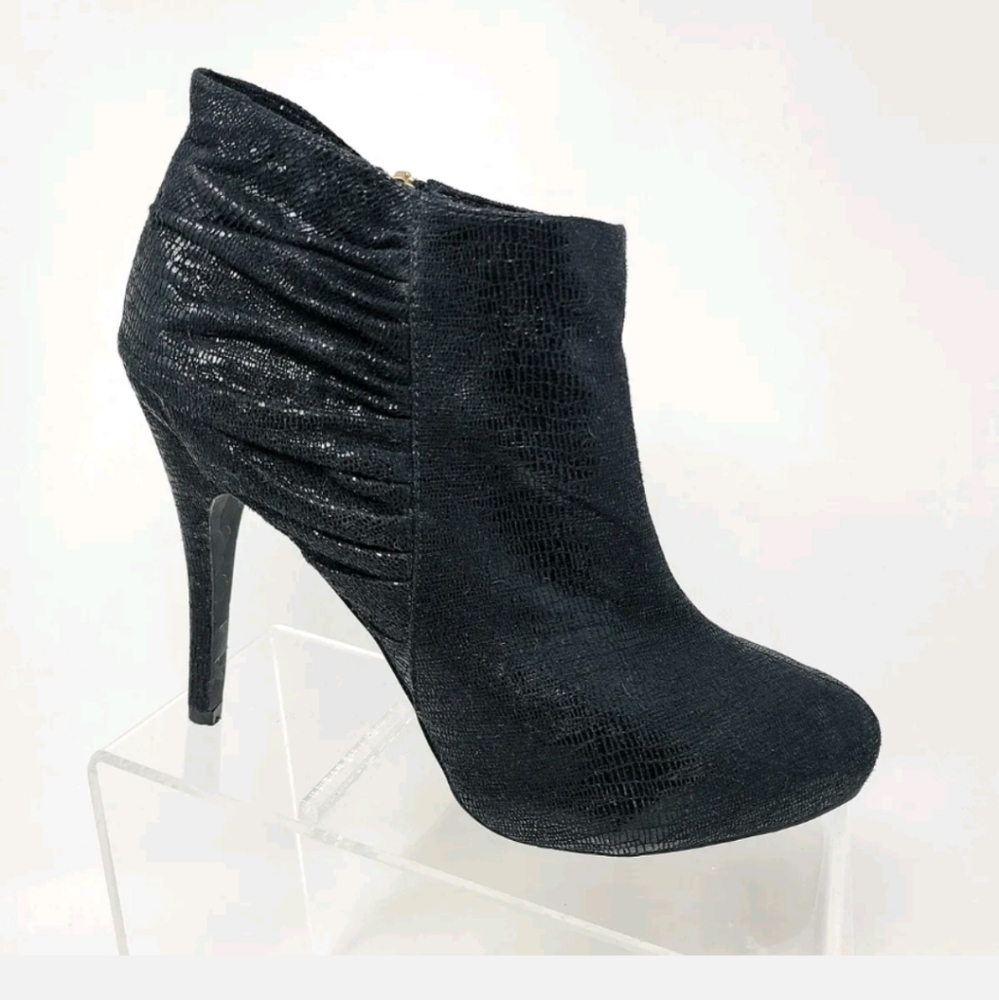 Colin Stuart black stiletto bootie..with some shine!! Used but great shape!